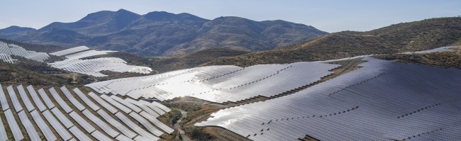 LUCAINENA DE LAS TORRES 2 PHOTOVOLTAIC POWER STATION COVERING VALLEYS AND HILLSIDES IN ANDALUCIA.