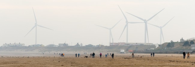 windmills and people walking