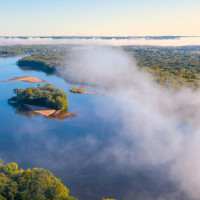 Freshwater lake surrounded by trees